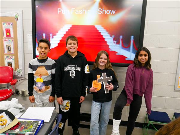 Fifth Graders putting on a Pun Fashion Show.